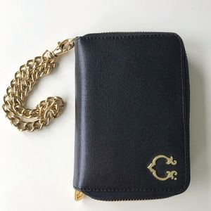 C. Wonder Clutch Wristlet Purse on Gold Chain